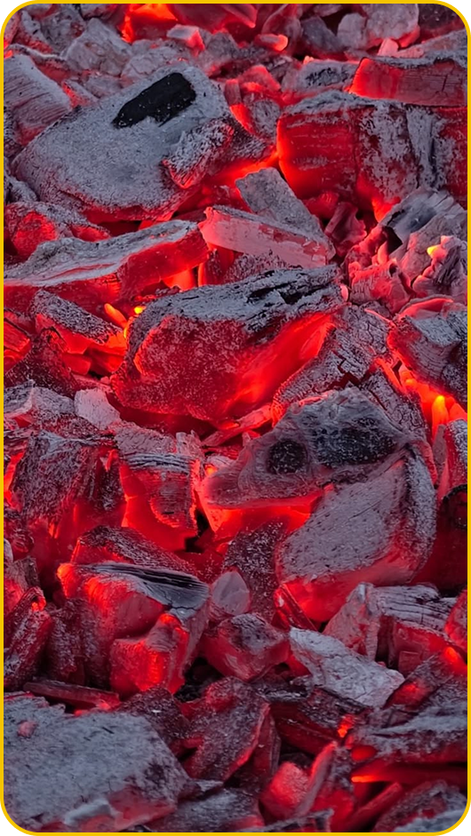 Fiery burning charcoal embers